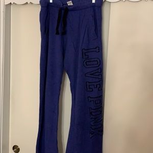 Pink VS blue sweat pants.